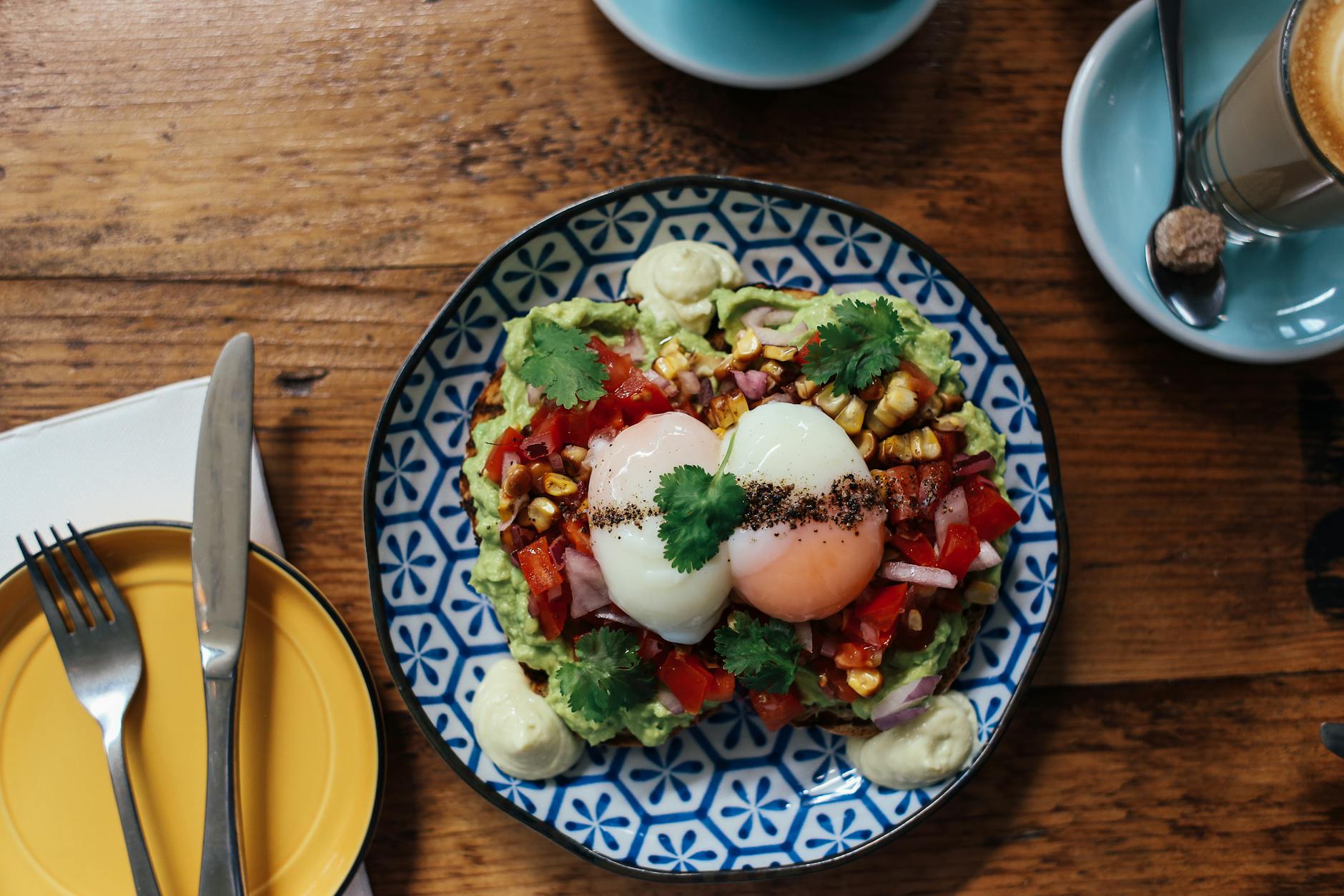 Brunch with poached eggs and avocado at a Glasgow cafe