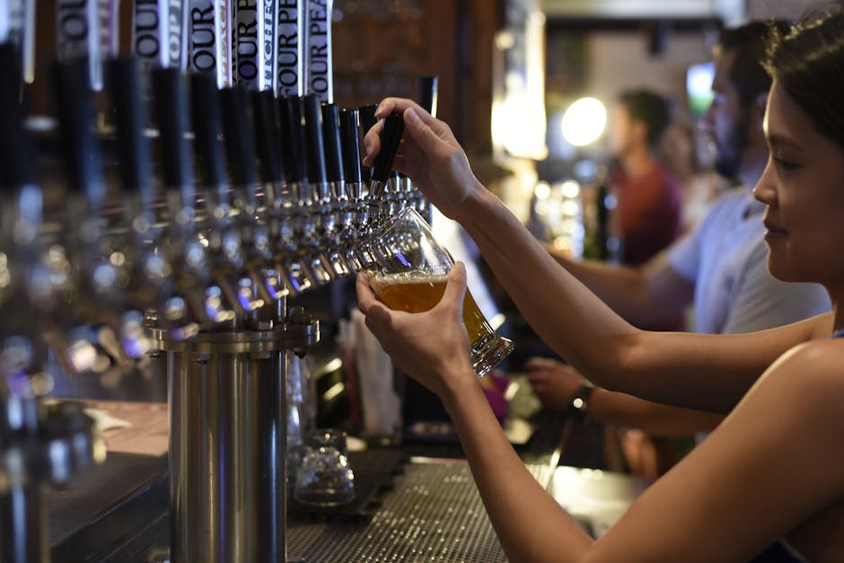 Flight of craft beer samples in a modern Glasgow brewery taproom