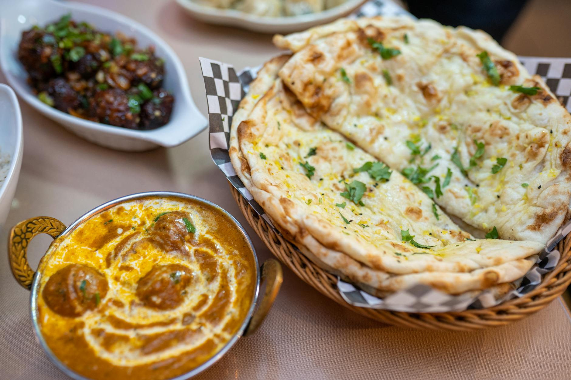 Best curry in Glasgow featuring authentic Indian curry dishes and naan bread