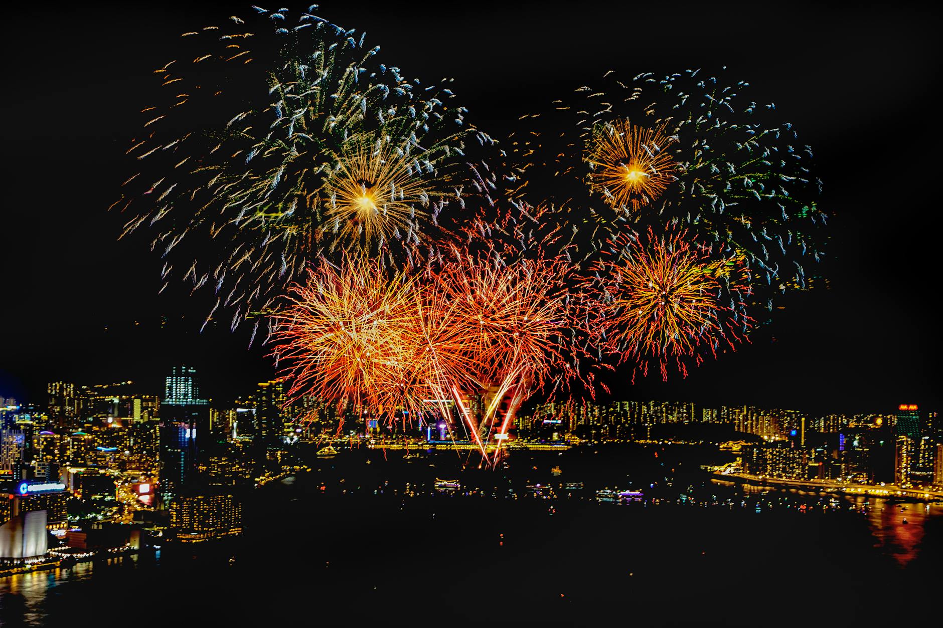 Fireworks display over city skyline during celebrations