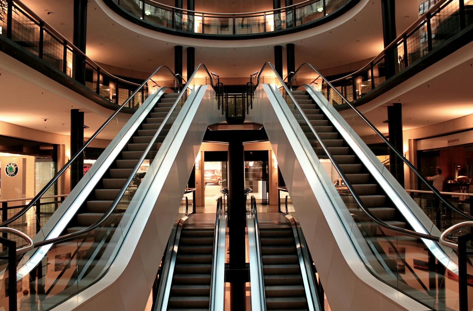Shopping in Glasgow - modern shopping centre interior with escalators