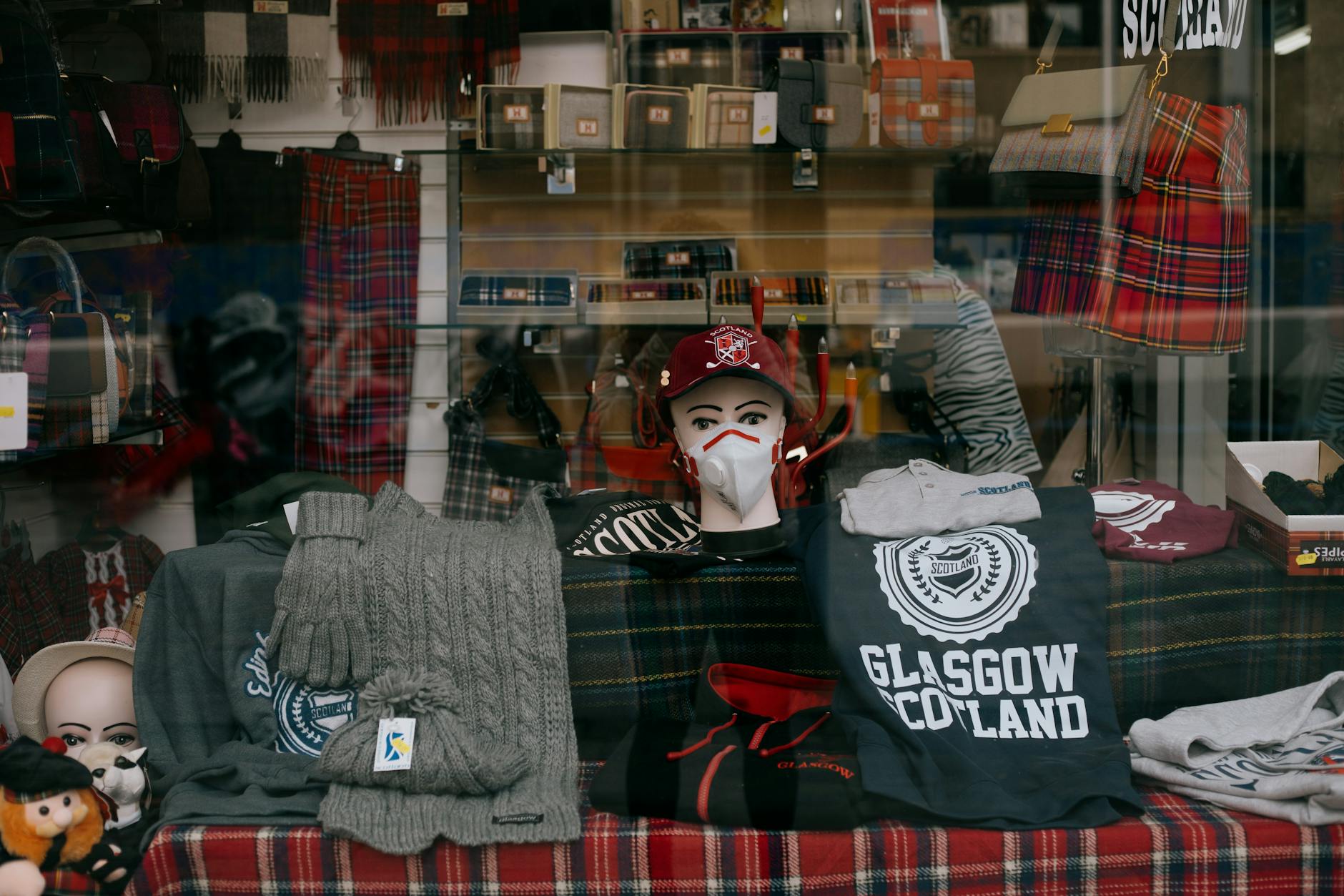Scottish souvenirs and gifts on a Glasgow shop display