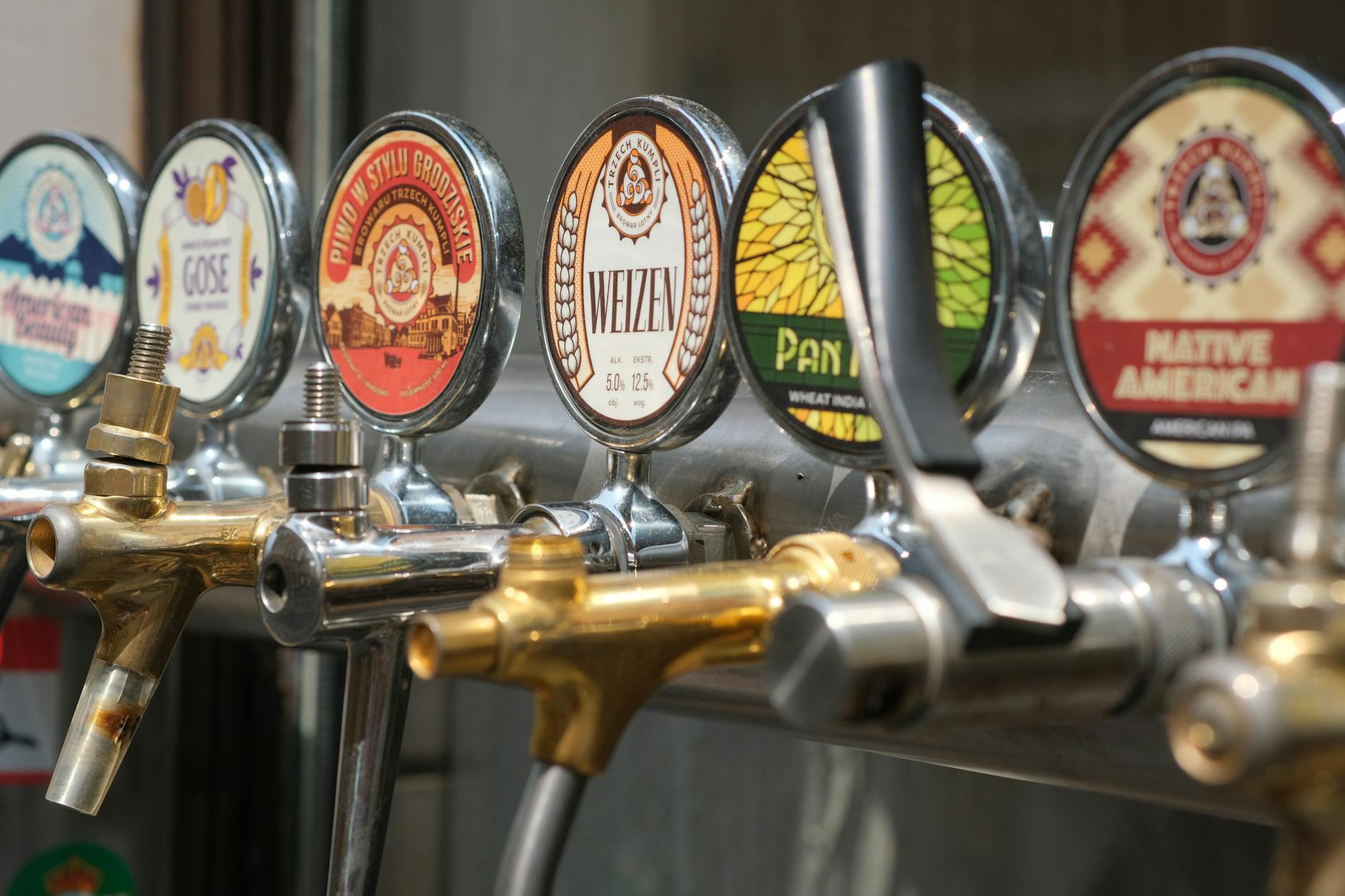 Craft beer taps at a Glasgow brewery featured on Glasgow whisky tours and brewery experiences